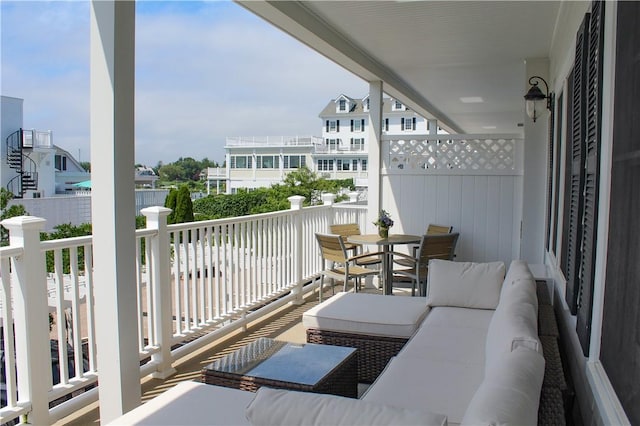 44 Bay St Unit B110, Westerly, RI 02891 - balcony featuring outdoor dining area and an outdoor living space