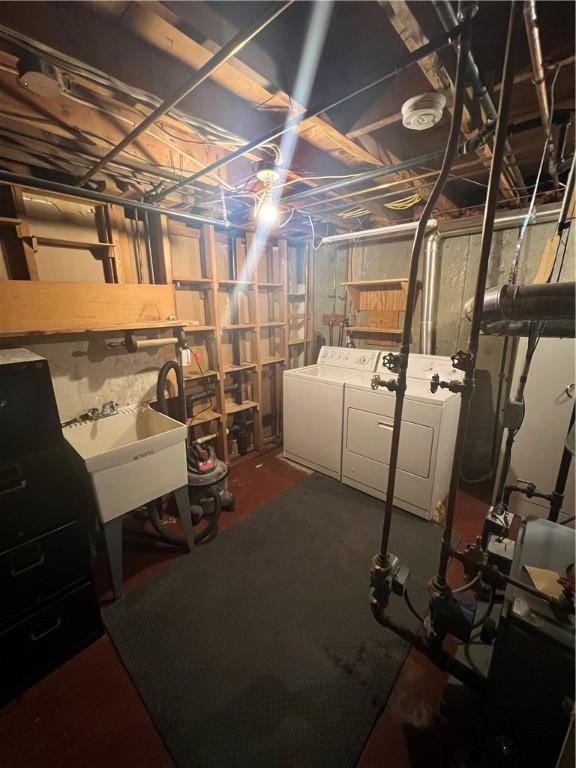 446 Angell Rd, North Providence, RI 02904 - unfinished basement with washing machine and dryer and a sink
