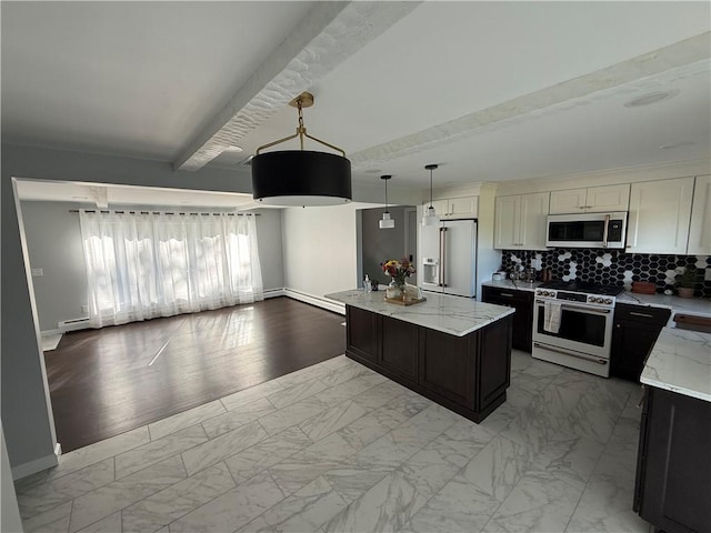 446 Angell Rd, North Providence, RI 02904 - kitchen with stainless steel appliances, baseboards, light marble finish floors, and beam ceiling