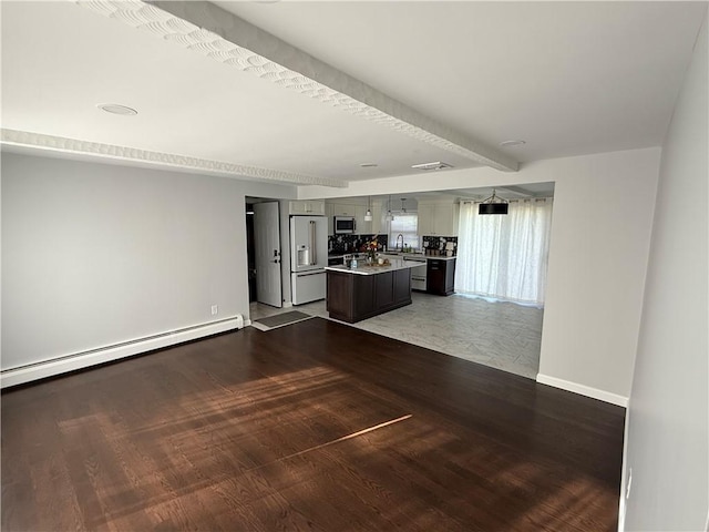 446 Angell Rd, North Providence, RI 02904 - unfurnished living room featuring a sink, a baseboard radiator, dark wood-style flooring, baseboards, and beamed ceiling