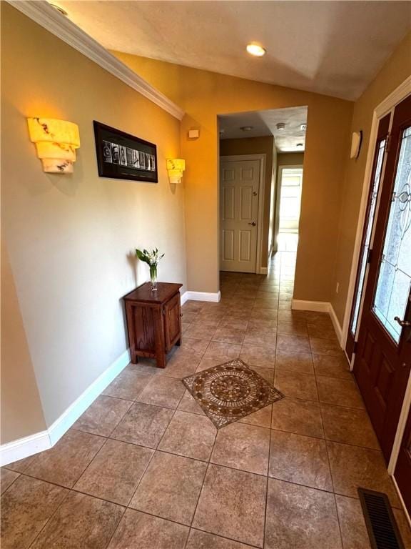hallway with baseboards, plenty of natural light, recessed lighting, and vaulted ceiling
