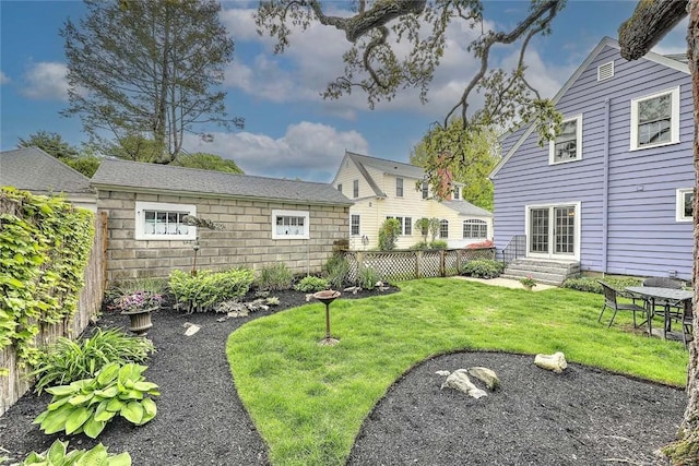 view of yard with entry steps