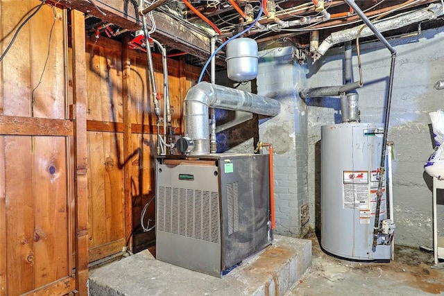 utility room with gas water heater