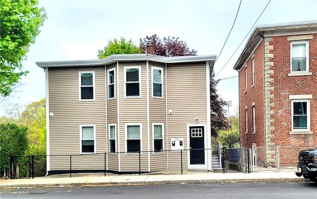 view of front of property with fence