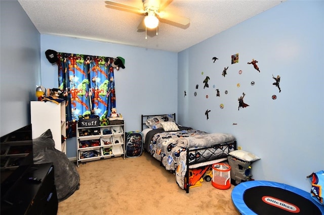 21 Apache Dr Unit D, Westerly, RI 02891 - bedroom with carpet, a textured ceiling, and ceiling fan