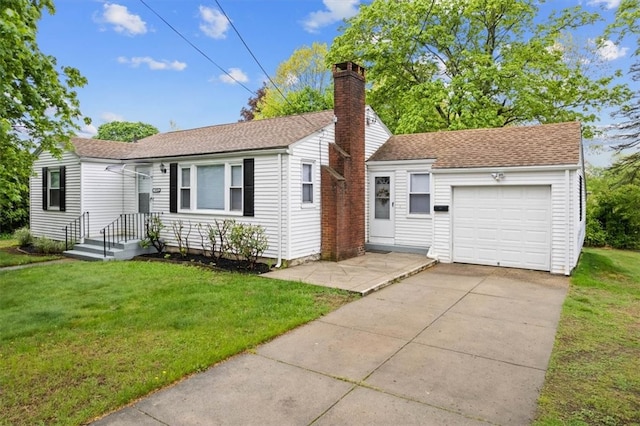 1075 Oaklawn Ave, Cranston, RI 02920 - view of front of home with an attached garage, a chimney, driveway, and a front yard