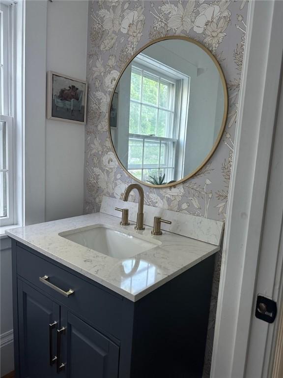 387 Camp Westwood Rd, Coventry, RI 02827 - bathroom featuring wallpapered walls and vanity