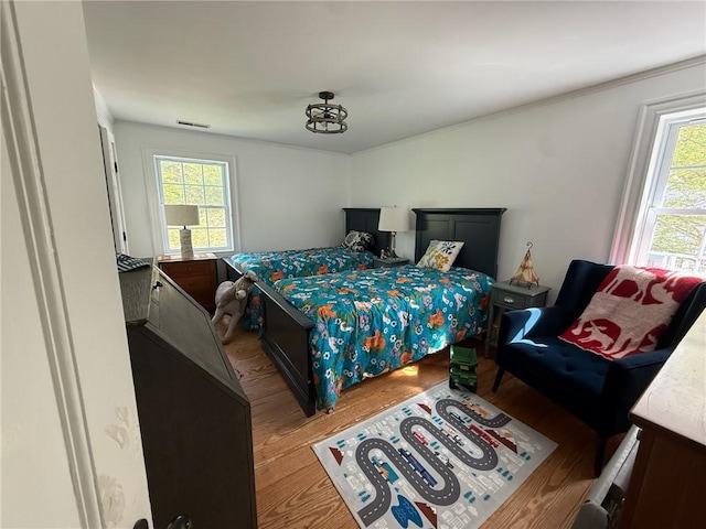 387 Camp Westwood Rd, Coventry, RI 02827 - bedroom featuring wood finished floors and multiple windows