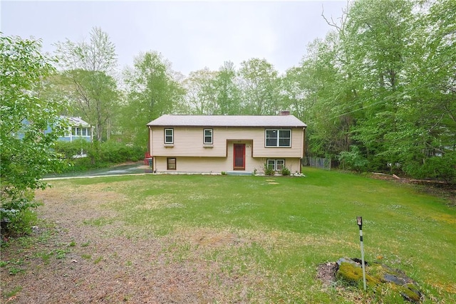 274 Courthouse Ln, Burrillville, RI 02859 - raised ranch featuring a chimney and a front yard