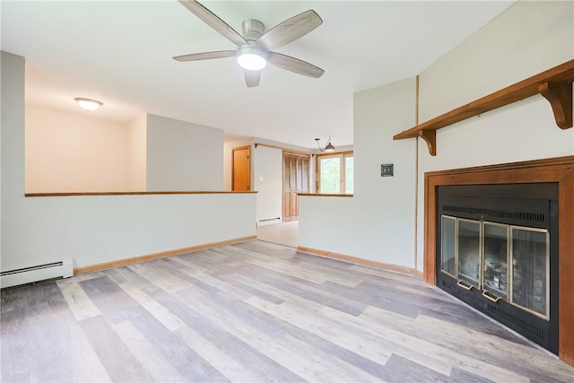 274 Courthouse Ln, Burrillville, RI 02859 - unfurnished living room featuring light wood-type flooring, a baseboard heating unit, a glass covered fireplace, ceiling fan, and baseboards