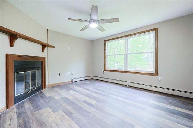 274 Courthouse Ln, Burrillville, RI 02859 - unfurnished living room with wood finished floors, a ceiling fan, and a glass covered fireplace