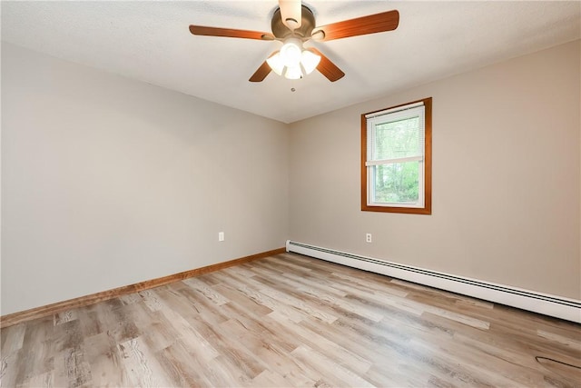 274 Courthouse Ln, Burrillville, RI 02859 - unfurnished room featuring a baseboard radiator, light wood finished floors, baseboards, and a ceiling fan