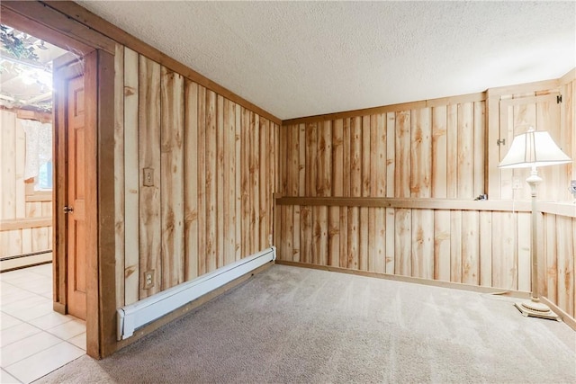 274 Courthouse Ln, Burrillville, RI 02859 - carpeted empty room featuring baseboard heating and a textured ceiling