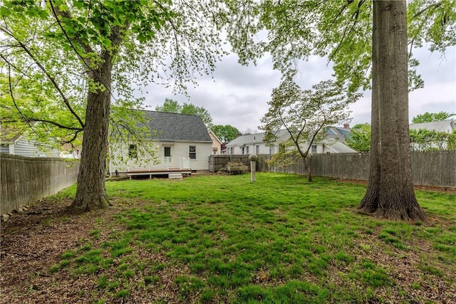 view of yard with a wooden deck