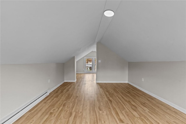 9 Lookout Ave, North Providence, RI 02911 - additional living space featuring a baseboard radiator, wood finished floors, vaulted ceiling, and baseboards