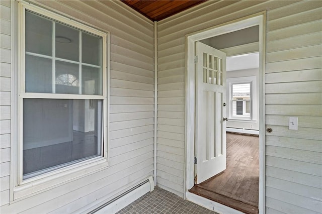 9 Lookout Ave, North Providence, RI 02911 - doorway to property featuring a baseboard radiator