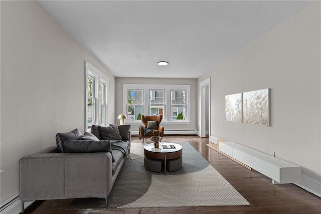9 Lookout Ave, North Providence, RI 02911 - living area with a baseboard heating unit, wood finished floors, and baseboards