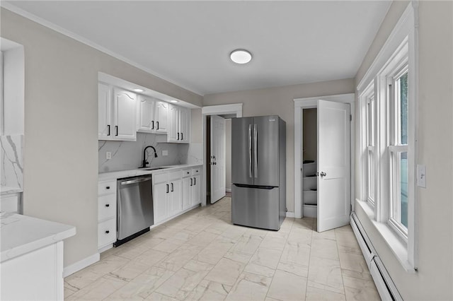 9 Lookout Ave, North Providence, RI 02911 - kitchen featuring appliances with stainless steel finishes, light marble finish floors, baseboard heating, and light countertops