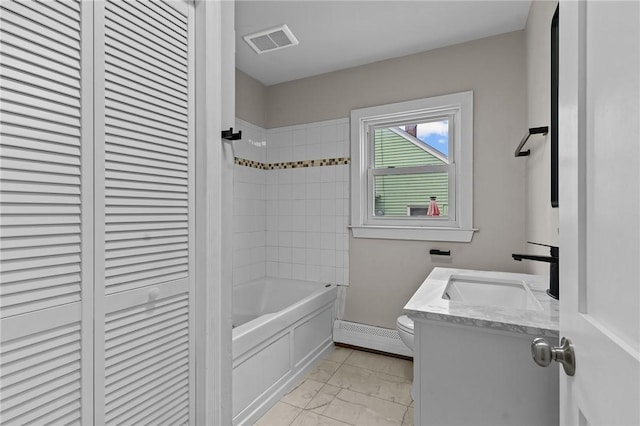 9 Lookout Ave, North Providence, RI 02911 - bathroom featuring marble finish flooring, toilet, a closet, vanity, and a baseboard radiator