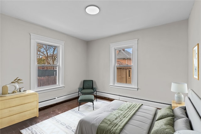 9 Lookout Ave, North Providence, RI 02911 - bedroom featuring a baseboard radiator and dark wood-style flooring