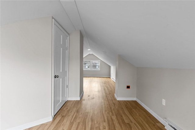 9 Lookout Ave, North Providence, RI 02911 - additional living space with lofted ceiling, light wood-style floors, a baseboard radiator, and baseboards