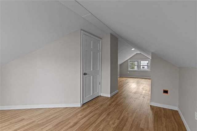 9 Lookout Ave, North Providence, RI 02911 - additional living space featuring light wood-style floors, vaulted ceiling, and baseboards