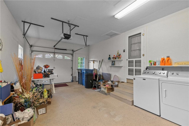 11 Cedar Ave, Middletown, RI 02842 - garage with washing machine and clothes dryer and a garage door opener