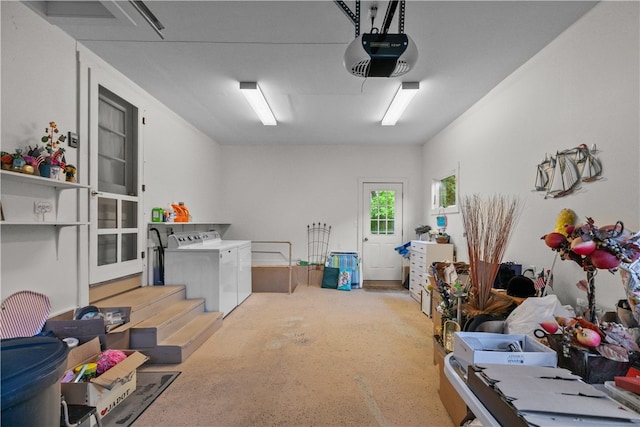 11 Cedar Ave, Middletown, RI 02842 - garage with a garage door opener and washing machine and dryer