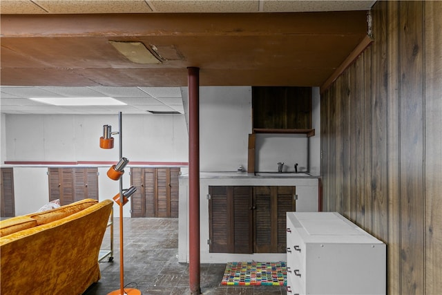 11 Cedar Ave, Middletown, RI 02842 - finished below grade area featuring wooden walls and a drop ceiling