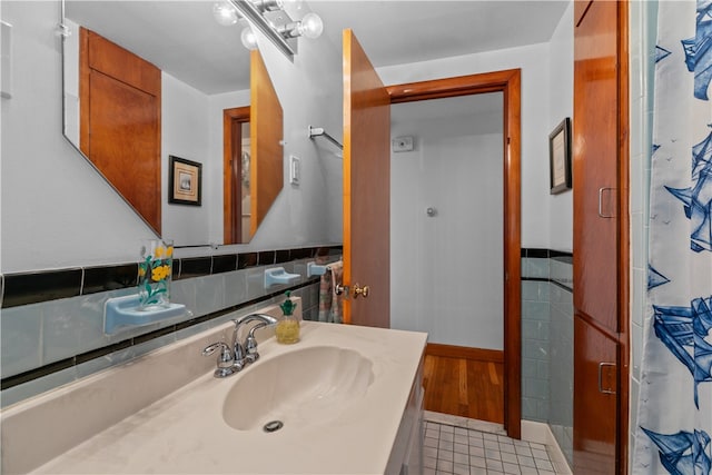 11 Cedar Ave, Middletown, RI 02842 - full bathroom with vanity, tile patterned floors, and a shower with shower curtain