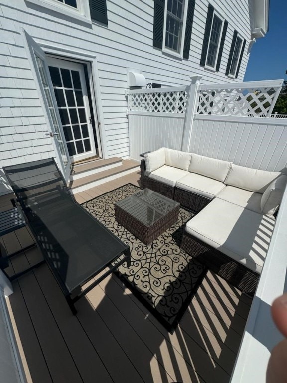 38 Bay St Unit W402, Westerly, RI 02891 - wooden deck featuring outdoor lounge area, entry steps, and fence