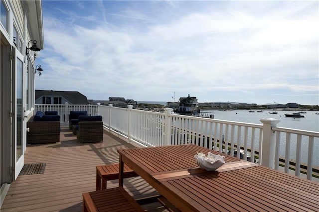 38 Bay St Unit W201/202, Westerly, RI 02891 - wooden deck featuring a water view and outdoor dining area