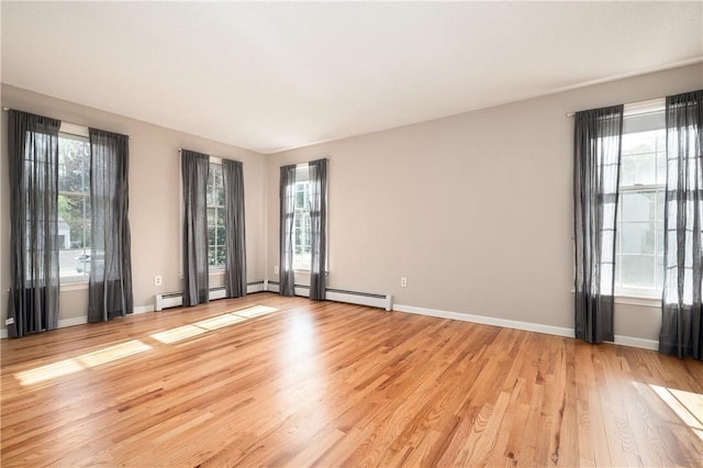 22 Linda Ln, South Windsor, CT 06074 - empty room with light wood finished floors and baseboards