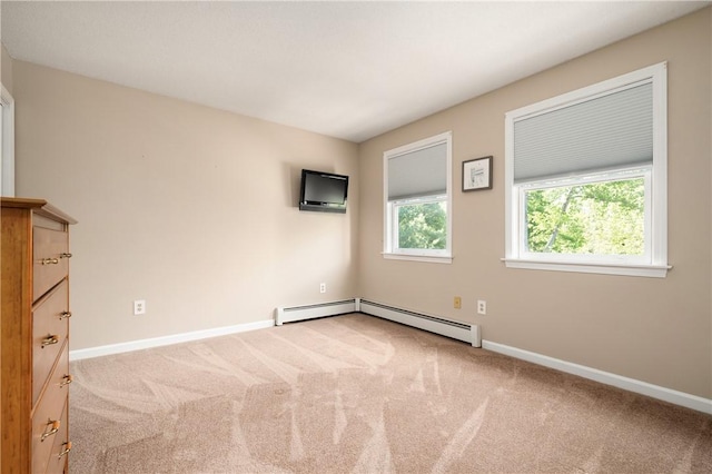 22 Linda Ln, South Windsor, CT 06074 - empty room featuring carpet flooring, baseboards, and a baseboard heating unit