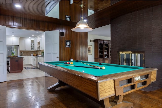 136 White Birch Cir, Scituate, RI 02831 - playroom with billiards table, a towering ceiling, a sink, and wood walls