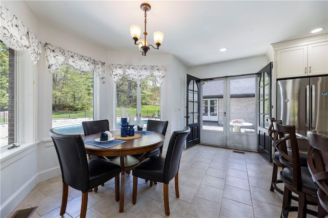 136 White Birch Cir, Scituate, RI 02831 - dining space featuring plenty of natural light, a chandelier, light tile patterned floors, recessed lighting, and french doors