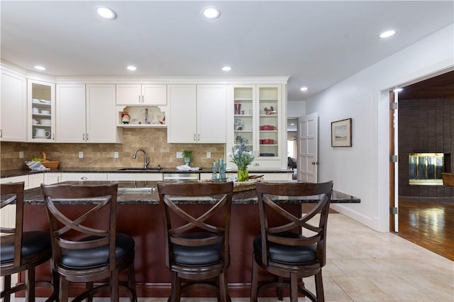 136 White Birch Cir, Scituate, RI 02831 - kitchen with white cabinetry, a sink, tasteful backsplash, and recessed lighting