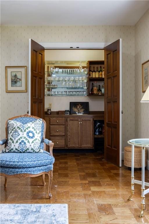 136 White Birch Cir, Scituate, RI 02831 - sitting room with wallpapered walls and light wood finished floors