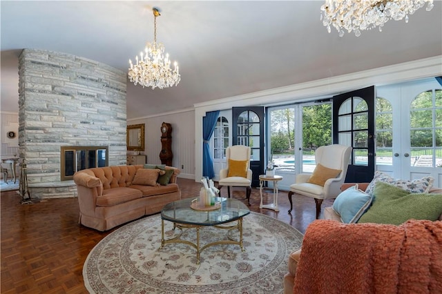 136 White Birch Cir, Scituate, RI 02831 - living room with a chandelier, french doors, plenty of natural light, and lofted ceiling