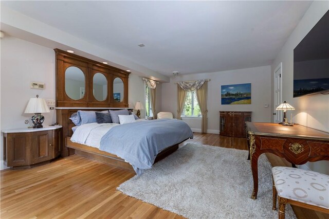136 White Birch Cir, Scituate, RI 02831 - bedroom with light wood-type flooring and baseboards