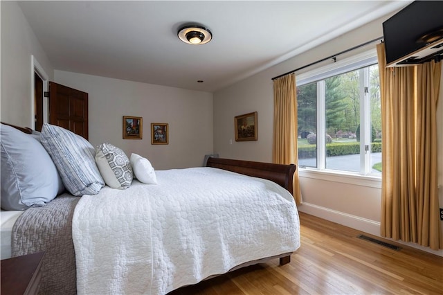 136 White Birch Cir, Scituate, RI 02831 - bedroom with light wood-type flooring and baseboards