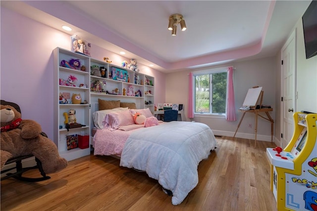 136 White Birch Cir, Scituate, RI 02831 - bedroom with light wood-style flooring, baseboards, a tray ceiling, and recessed lighting