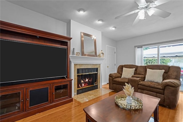 14 Ginger Trl, Coventry, RI 02816 - living room featuring light wood-style flooring, a high end fireplace, a ceiling fan, and recessed lighting