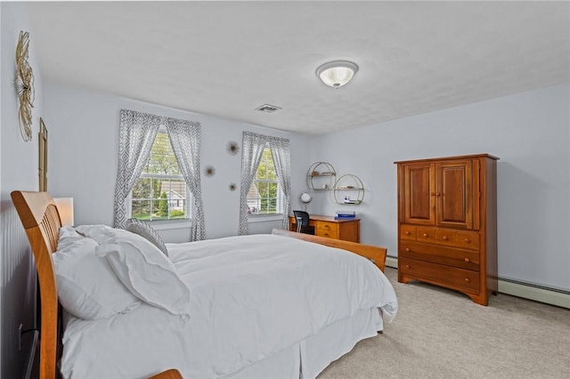 14 Ginger Trl, Coventry, RI 02816 - bedroom with light colored carpet and a baseboard heating unit