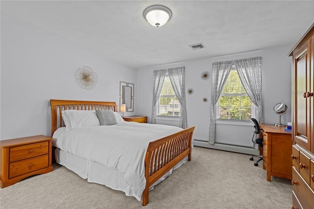 14 Ginger Trl, Coventry, RI 02816 - bedroom with baseboard heating, light colored carpet, and a desk