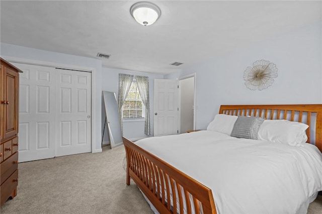 14 Ginger Trl, Coventry, RI 02816 - bedroom with light colored carpet, a closet, and baseboards
