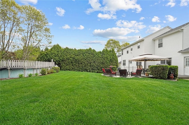 14 Ginger Trl, Coventry, RI 02816 - view of grassy yard featuring a gazebo and a patio area