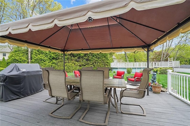 14 Ginger Trl, Coventry, RI 02816 - deck featuring a gazebo, grilling area, fence, and outdoor dining space