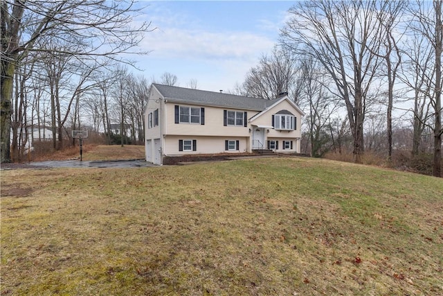 10 Mill Rd, North Branford, CT 06471 - view of front of house with driveway, a garage, and a front yard
