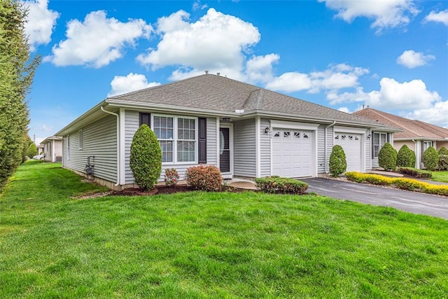 1404 Village Green Cir, Coventry, RI 02816 - ranch-style home featuring a garage, asphalt driveway, and a front yard